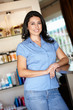 Woman working in hairdressing salon