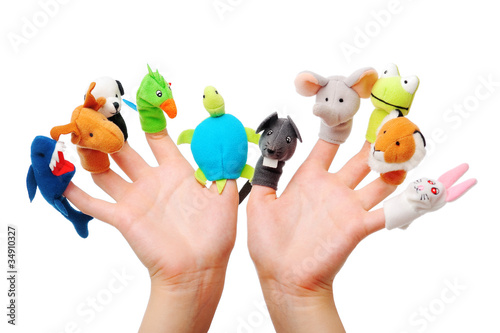 Photo: Female hand wearing 10 finger puppets Female hand wearing 10 finger puppets