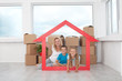 Happy family in their new home