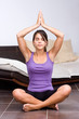 Pretty young woman meditating