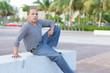 Mature adult sitting on a park bench