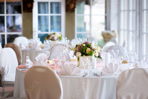 Photo: Table set for an event party or wedding reception Table set for an event party or wedding reception