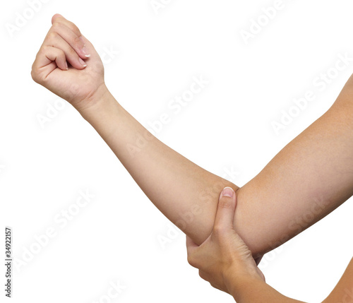 Photo: Acute pain in a woman elbow Acute pain in a woman elbow