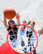 Teenagers playing basketball Teenagers playing basketball