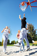 Teenagers playing basketball