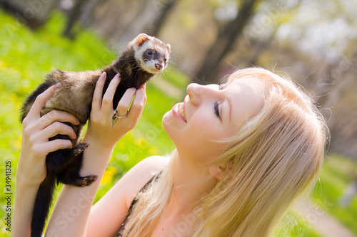 Photo: Girl with a polecat Girl with a polecat