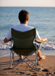 man resting on the beach