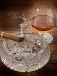 cuban cigar over ash tray and cognac cuban cigar over ash tray and cognac
