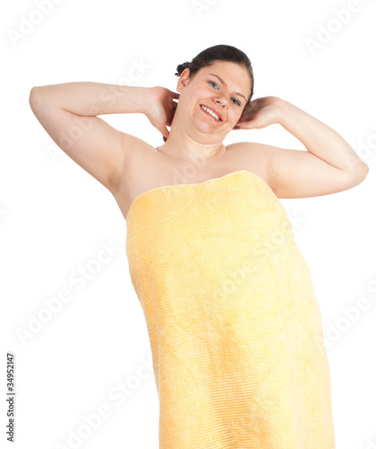 Foto: fat, overweight black hair woman in yellow towel, series.. fat, overweight black hair woman in yellow towel, series..