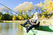 fishing woman sitting on boat