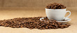 White cup with coffee grains