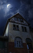 Foto: Sinister old house in Halloween night. Bats, Moon Sinister old house in Halloween night. Bats, Moon