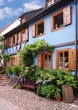 blumengschmücktes Haus