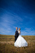 Beautiful couple on the yellow field