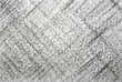 Black diagonal pattern on paper texture