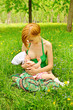 Mother feeding her baby Mother feeding her baby