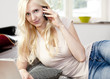 Young woman using Laptop and phone