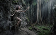Sexy woman as a part of tree
