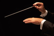 Conductor conducting an orchestra