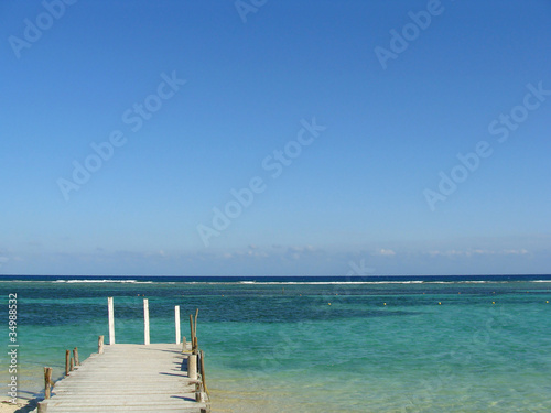 Photo: Sea, sky and pier in the Mexican Caribbean Sea, sky and pier in the Mexican Caribbean