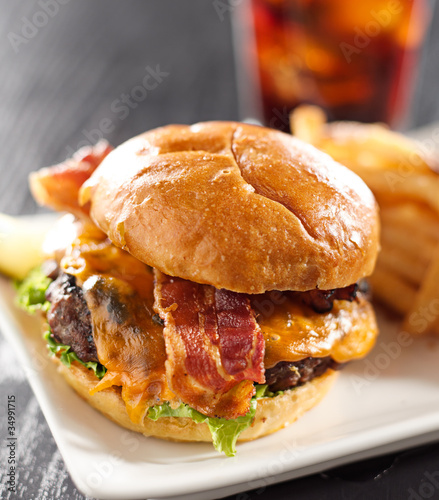 Photo: Bacon cheeseburger shot with selective focus Bacon cheeseburger shot with selective focus