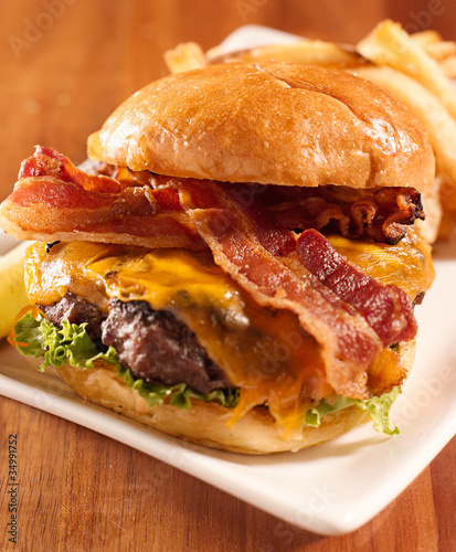 Photo: Bacon cheeseburger shot with selective focus Bacon cheeseburger shot with selective focus