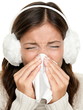Flu winter sick woman sneezing of cold