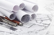 rolls of architecture blueprint & work tools - ruler, pencil
