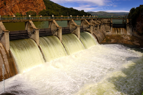 Photo: Release of water at a dam wall. Release of water at a dam wall.