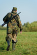 hunter with rifle gun