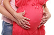 Hands of pregnant woman and her husband