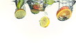 Slices of oranges, limes and lemons falling into water