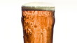 Overflowing liquid in a glass