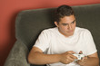 Hispanic teenager playing video game
