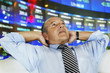 Hispanic businessman at stock exchange