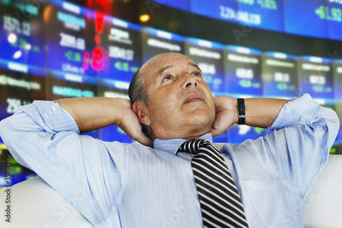 Photo: Hispanic businessman at stock exchange Hispanic businessman at stock exchange