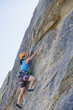Japanese woman rock climbing
