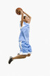 Mixed race woman playing basketball