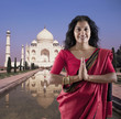 Photo: Indian woman in traditional clothing near the Taj Mahal Indian woman in traditional clothing near the Taj Mahal