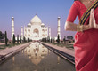 Photo: Indian woman in traditional clothing near the Taj Mahal Indian woman in traditional clothing near the Taj Mahal