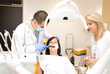 A dentist and a nurse curing