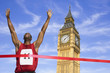 Black athlete crossing finish line