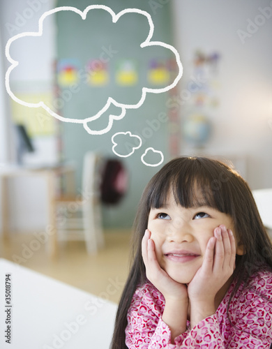 Photo: Chinese girl with thought bubble in classroom Chinese girl with thought bubble in classroom