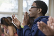 Students clapping classroom