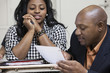 Teacher talking to student in classroom