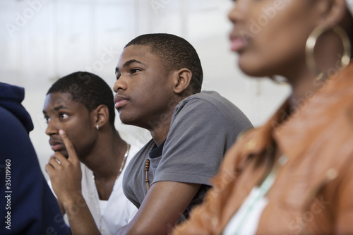 Photo: Students listening in classroom Students listening in classroom