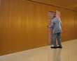 African American businessman opening door to nowhere