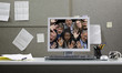 Business people trapped in computer monitor
