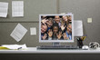 Business people trapped in computer monitor