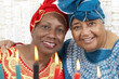 African American mother and daughter in traditional clothing